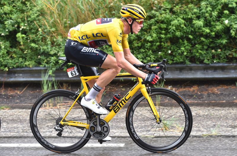 A wet Rohan Dennis in the yellow jersey