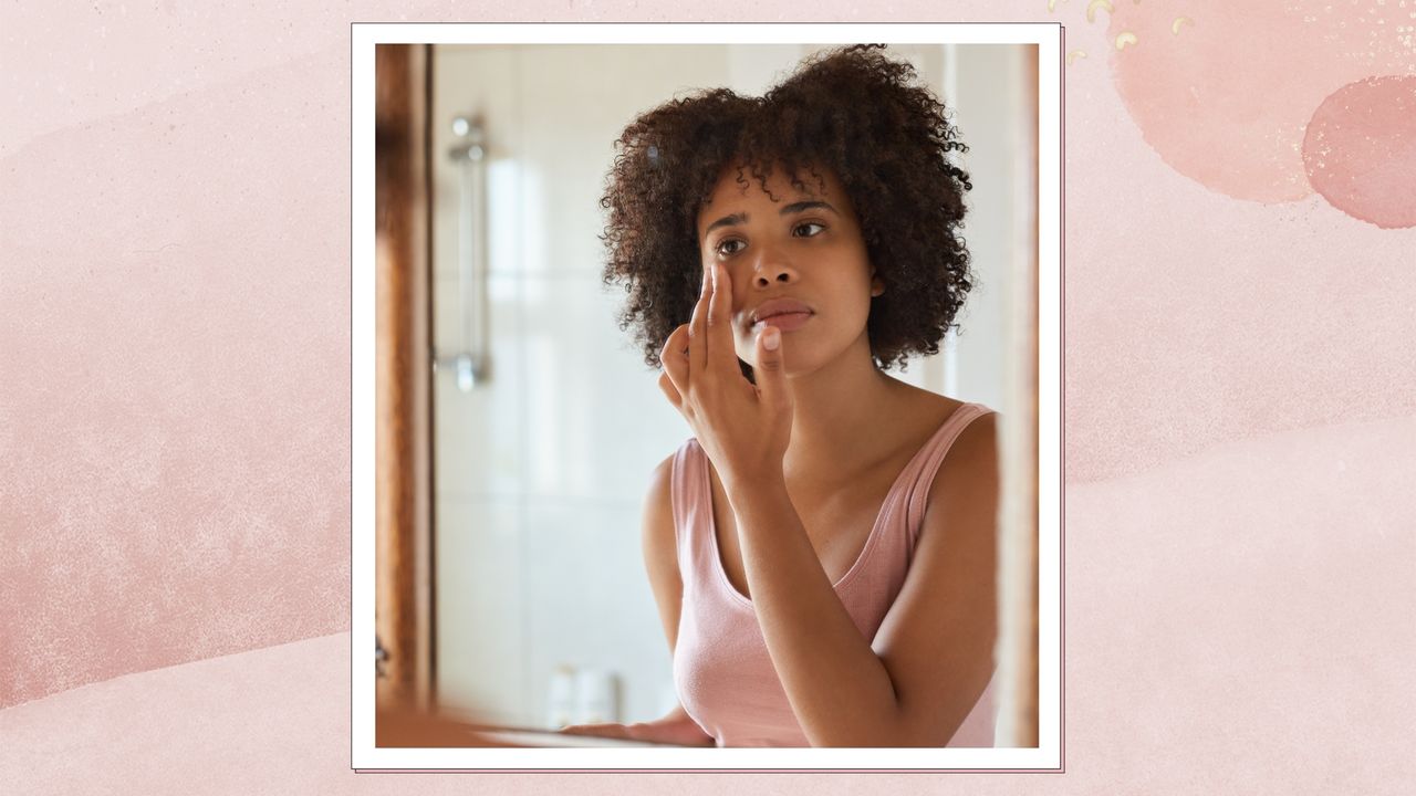 A woman applying skincare to her face with her fingers in a pink watercolour paint-style template