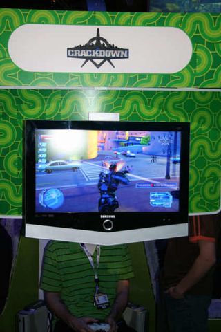 An E3 attendee immerses himself in a demo of Crackdown, a forthcoming title for Xbox 360