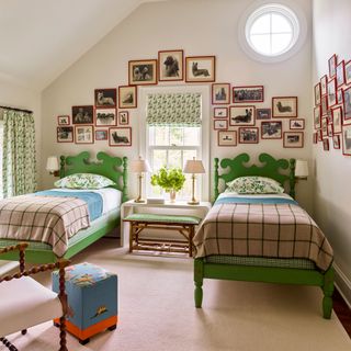 Green painted twin beds, dog pictures