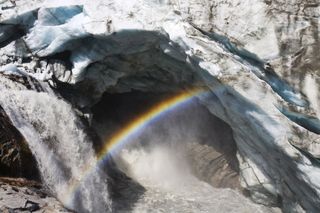 As ice in Greenland melts at the surface, water carves fissures and reaches the base, where ice meets land. This sub-glacial ice can lubricate a glacier, causing it to flow to the ocean faster and be depleted more quickly.