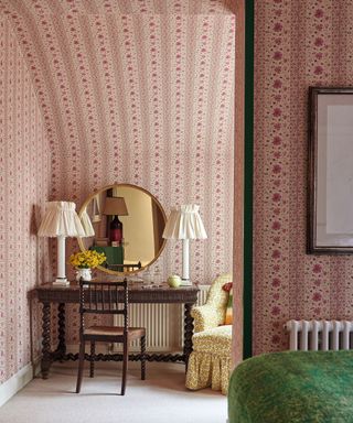 interior decorated with floral pattern dressing table with floral wallpaper