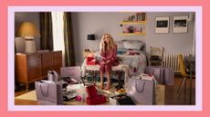 sarah jessica parker as carrie bradshaw in her apartment with shopping bags in and just like that season 2
