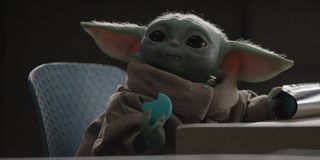 Grogu (Baby Yoda) chows down on a snack on The Mandalorian (2020)