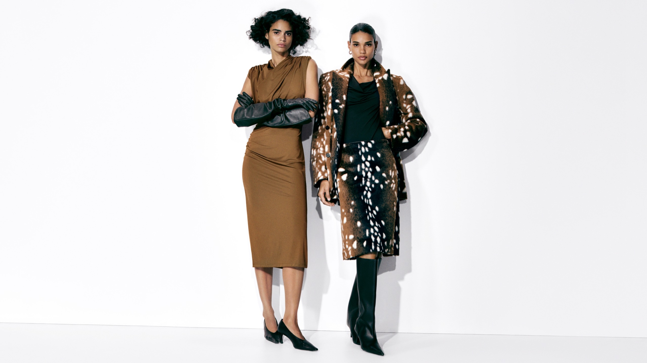 2 models wearing H&amp;M clothing for winter collection