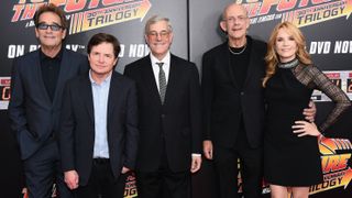 Huey Lewis, Michael J. Fox, Bob Gale, Christopher Lloyd, and Lea Thompson attend the Back to the Future reunion with fans in celebration of the Back to the Future 30th Anniversary Trilogy on Blu-ray and DVD on October 21, 2015 at AMC Loews Lincoln Square 13 in New York Cit