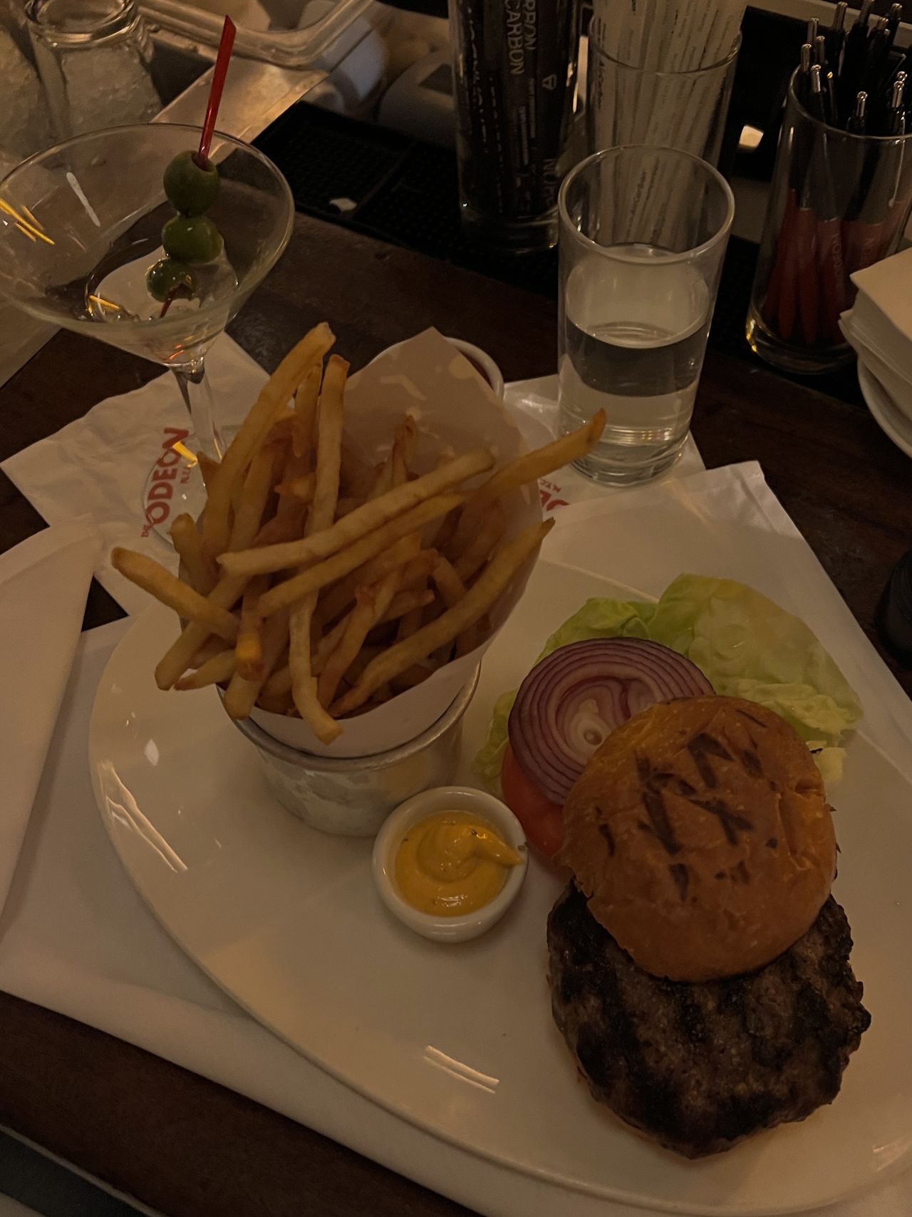 burger and fries with martini