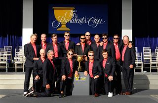 U.S. Team captain Fred Couples poses with his team and the Presidents Cup during the closing ceremonies after defeating the International team 19-15 at the 2011 Presidents Cup at Royal Melbourne Golf Course on November 20, 2011 in Melbourne, Australia.