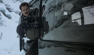Mission:Impossible - Fallout Henry Cavill August Walker aims that massive gun out of the helicopter