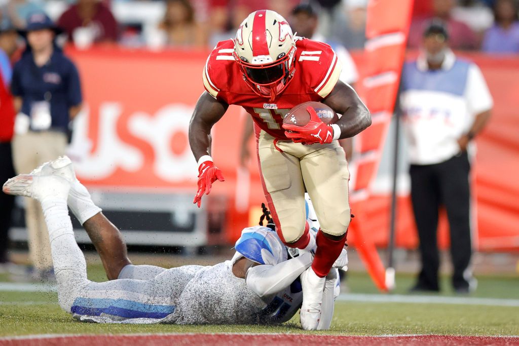  CJ Marable of the Birmingham Stallions scores a touchdown against Jerod Fernandez of the New Orleans Breakers during the third quarter in the USFL South Division Championship at Protective Stadium on June 25 in Birmingham, Alabama.