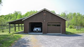 Big American dual garage with Vivint camera