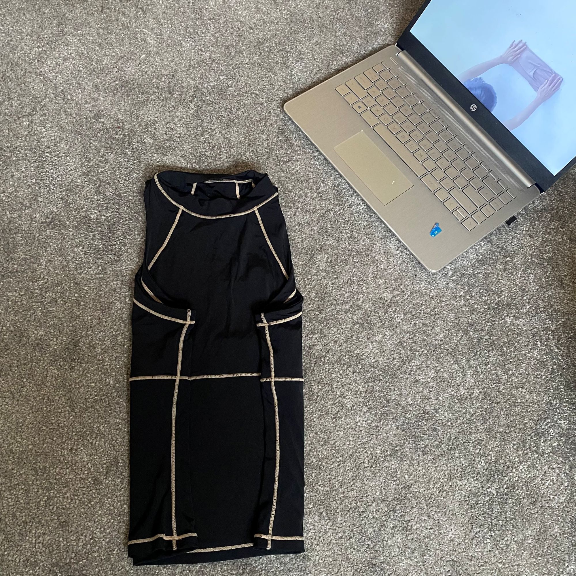 Katie trying the KonMari folding method to organise her clothes