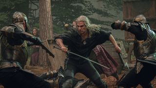 Geralt (Henry Cavill) fighting two armored foes in The Witcher season 3
