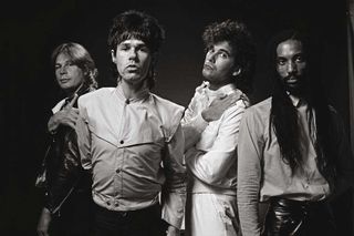 Gary Moore with G-Force: drummer Mark Nauseef, bassist Tony Newton and keyboard player Willie Dee