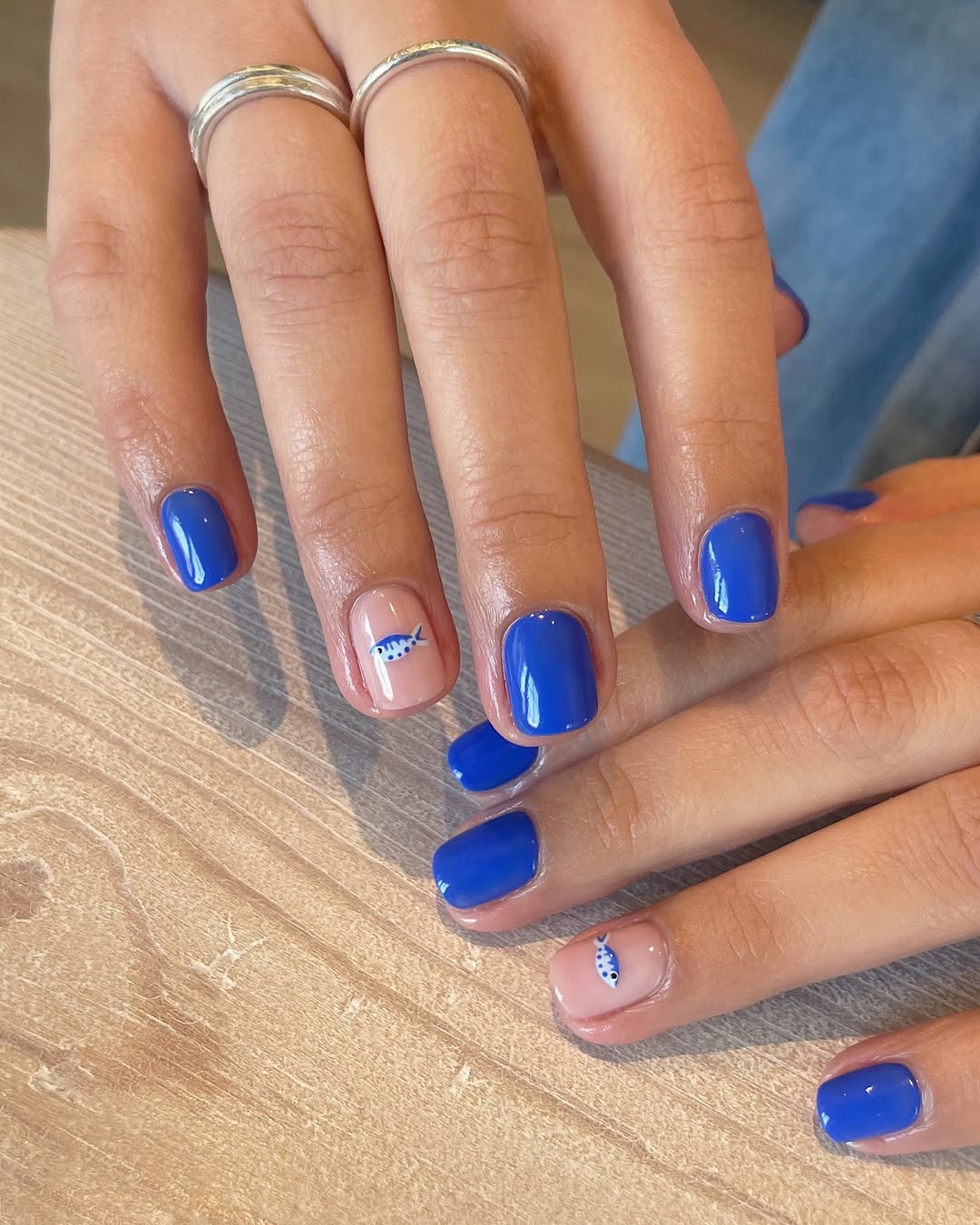 cobalt blue nails with fish designs