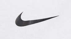 Black Nike logo on white fabric