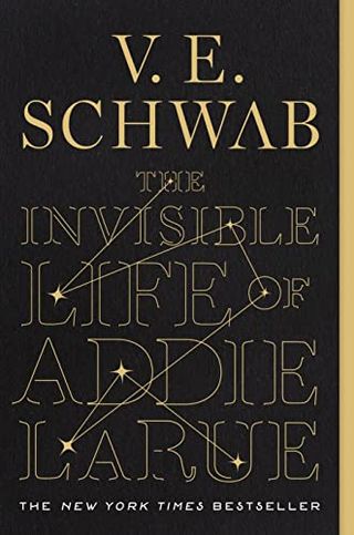 The Invisible Life of Addie Larue book cover featuring the letters in gold over black text and a constellation