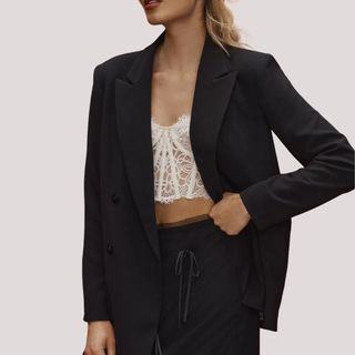 flat lay image of black blazer