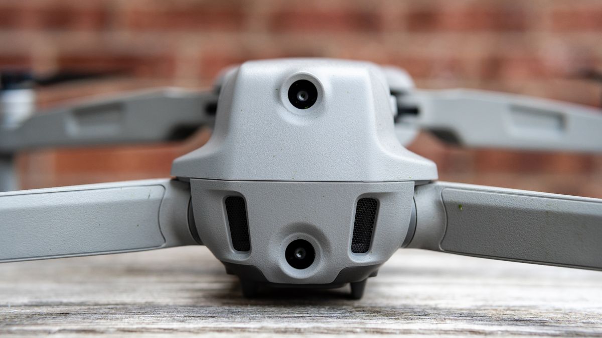 The back of the DJI Air 2S drone resting on a wooden table