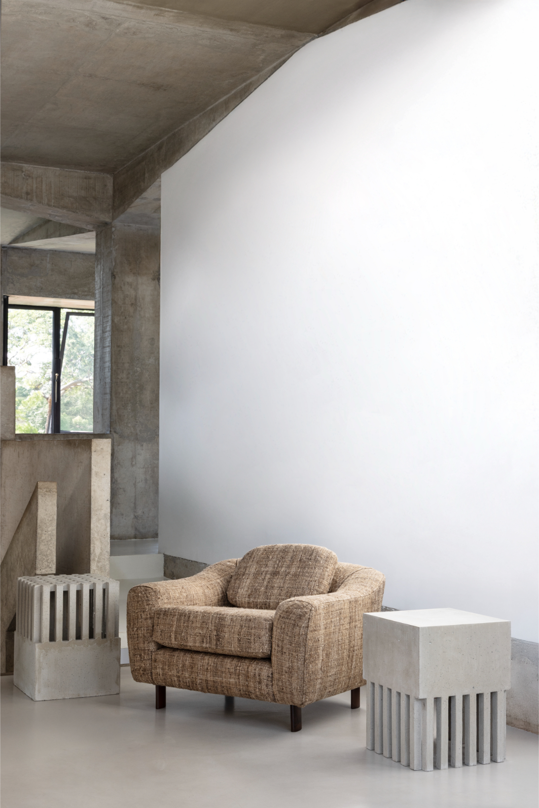 Modernist Brazilian furniture in brutalist house interior
