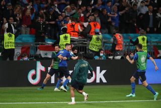 Italy’s Jorginho celebrates scoring the winning penalty in the semi-final against Spain at Wembley