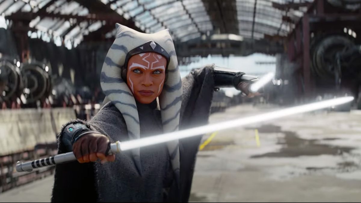 Rosario Dawson as Ahsoka Tano, holding two lightsabers, in the Ahsoka trailer