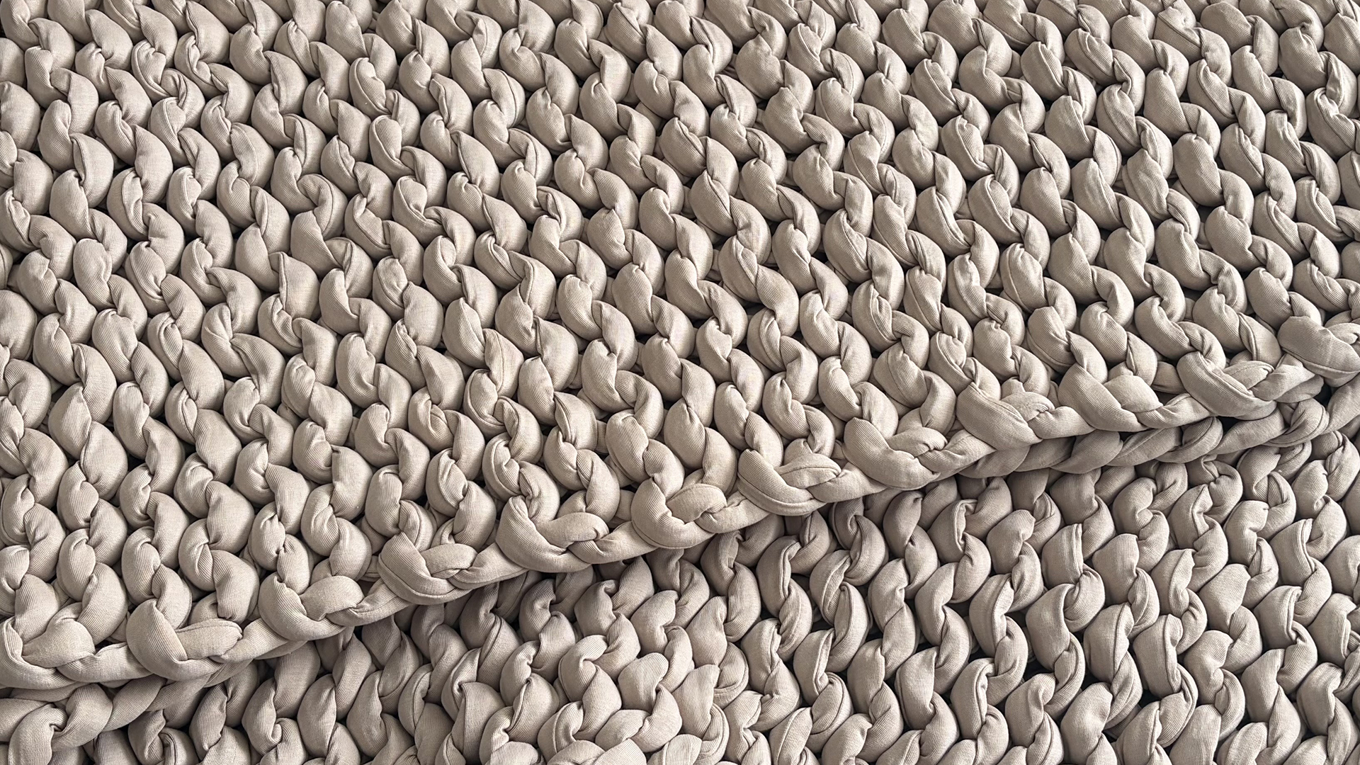A close up of the knit on the Bearaby Tree Napper weighted blanket