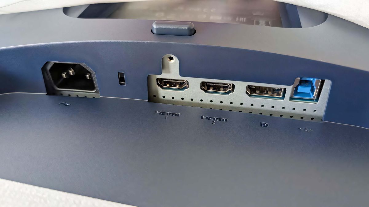 A closeup of the Alienware 34 Curved QD-OLED AW3425DW's power, HDMI, DisplayPort, and USB-B port.