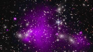Shown is the galaxy cluster Abell 2744, with the distant galaxy UHZ1 that formed just 470 million years after the Big Bang. It was imaged by the Chandra X-Ray Observatory and the James Webb Space Telescope (inset). The blue glow is X-rays from the hot gas in the cluster, and inset, from hot gas around the black hole at the center of UHZ1.