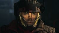 Screenshot from The Expanse: Osiris Reborn, showing a man in a sci-fi spacesuit.