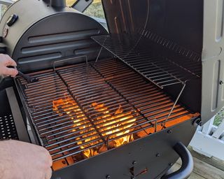 Char-Griller Duo Combo Grill being tested in writer's home