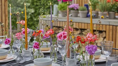 a tall square concrete vase with birch branches is a cool and fresh idea to  decorate any space giving it a natu…