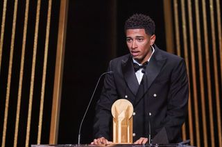 Real Madrid's English midfielder Jude Bellingham speaks on stage as he recieves with the Kopa Trophy for best under-21 player during the 2023 Ballon d'Or France Football award ceremony at the Theatre du Chatelet in Paris on October 30, 2023.