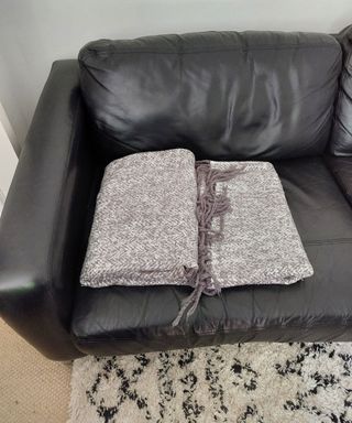 blanket being folded for a tiktok hack