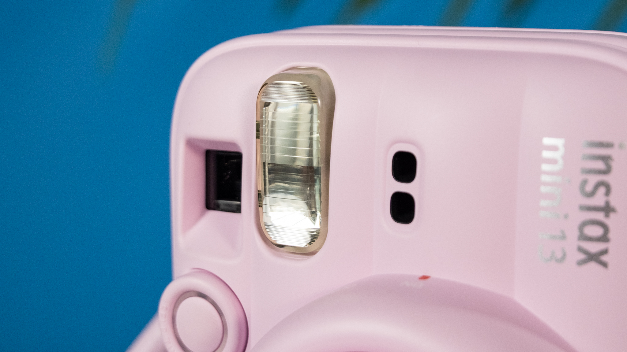 A Candy Pink Fujifilm Instax mini 13 instant camera