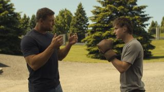 Reacher and Richard Beck sparring outside in Reacher Season 3