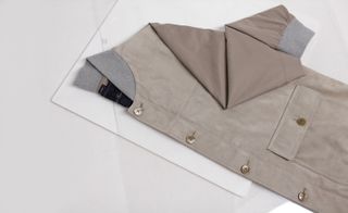 A tan suede bomber jacket