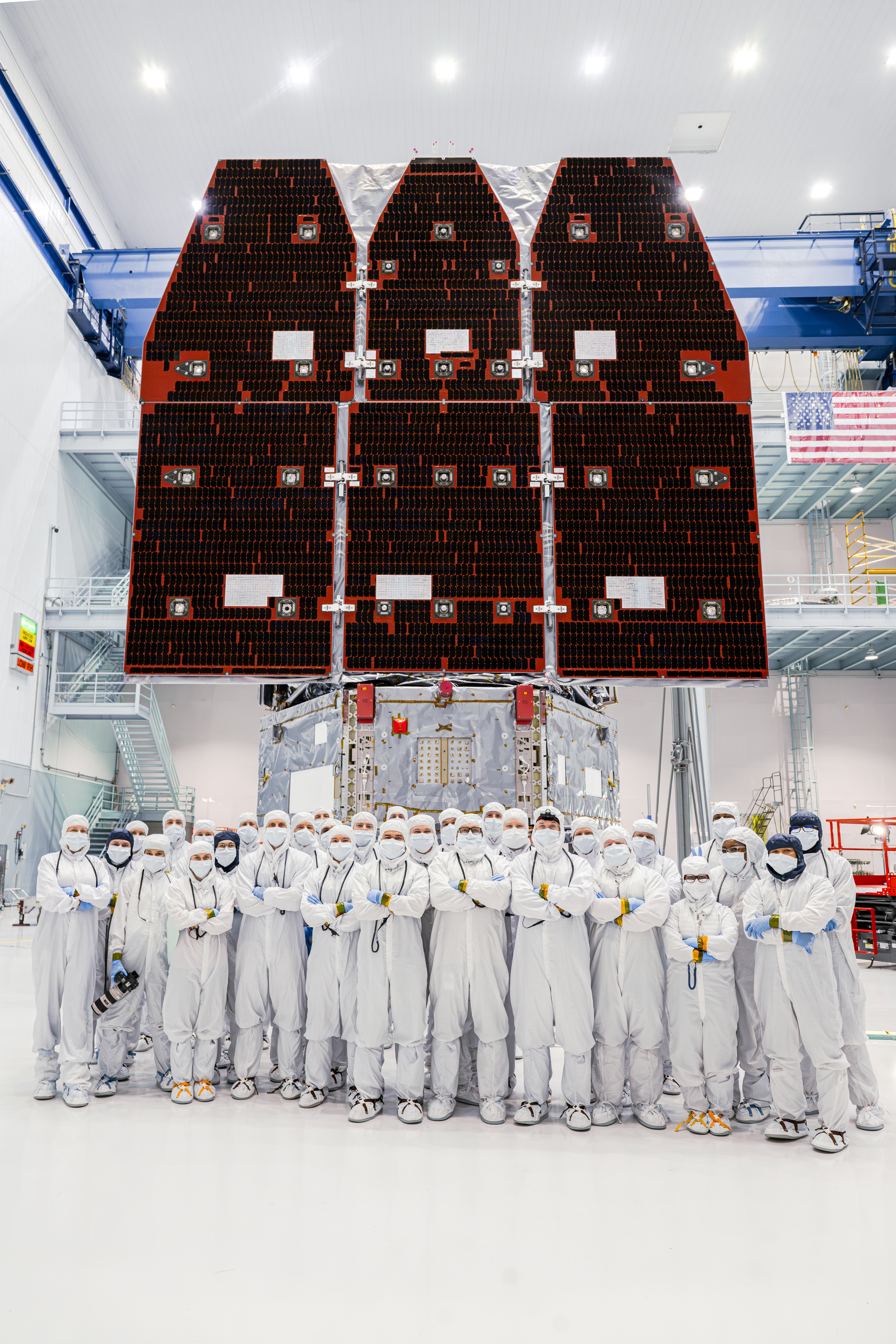Workers finish assembling the Nancy Grace Roman Space Telescope in a clean room