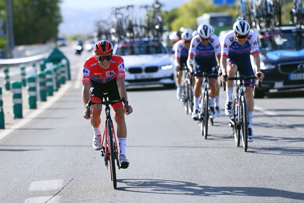 MADRID SPAIN SEPTEMBER 11 Remco Evenepoel of Belgium and Team QuickStep Alpha Vinyl Red Leader Jersey competes during the 77th Tour of Spain 2022 Stage 21 a 967km stage from Las Rozas to Madrid LaVuelta22 WorldTour on September 11 2022 in Madrid Spain Photo by Tim de WaeleGetty Images