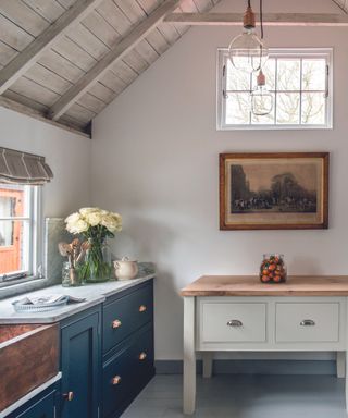 modern rustic small kitchen with vintage wall art