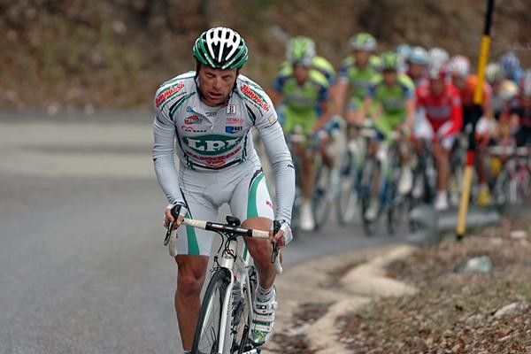 Italian Danilo Di Luca (LPR Brakes-Farnese Vini) breaks away from a bunch.