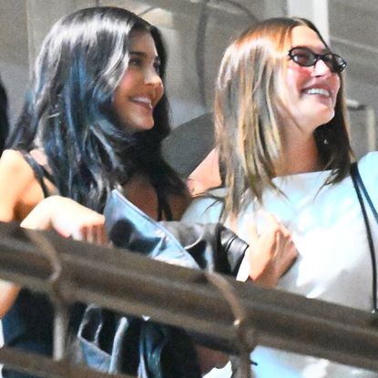 Kylie Jenner borrowed Hailey Bieber's vintage Versace jacket at a podcast recording event 