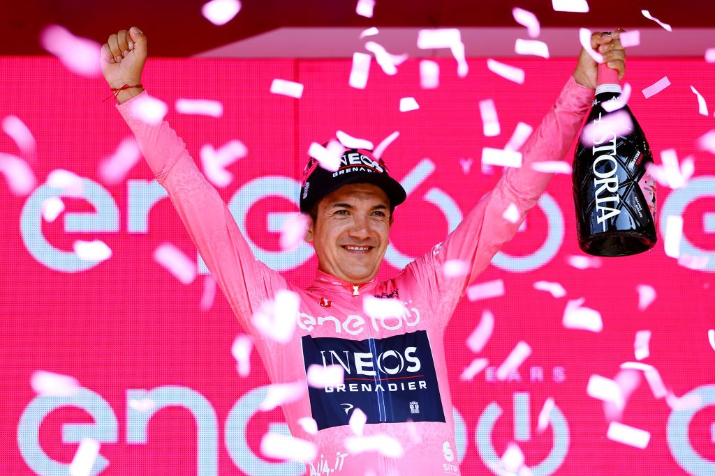 TURIN ITALY MAY 21 Richard Carapaz of Ecuador and Team INEOS Grenadiers celebrates winning the pink leader jersey on the podium ceremony after the 105th Giro dItalia 2022 Stage 14 a 147km stage from Santena to Torino Giro WorldTour on May 21 2022 in Turin Italy Photo by Michael SteeleGetty Images