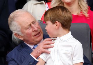 King Charles sat with Prince Louis on his knee at Platinum Jubilee