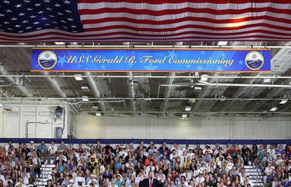 President Trump at the commissioning of a new aircraft carrier