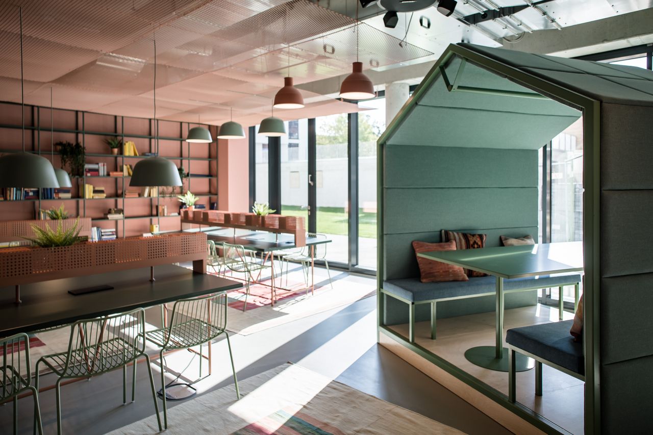 green and pink interior of student housing in Leipzig by Berlin-based industrial designers Studio Aisslinger