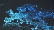 A digital render of Europe, lit in blue lights against a dark map.