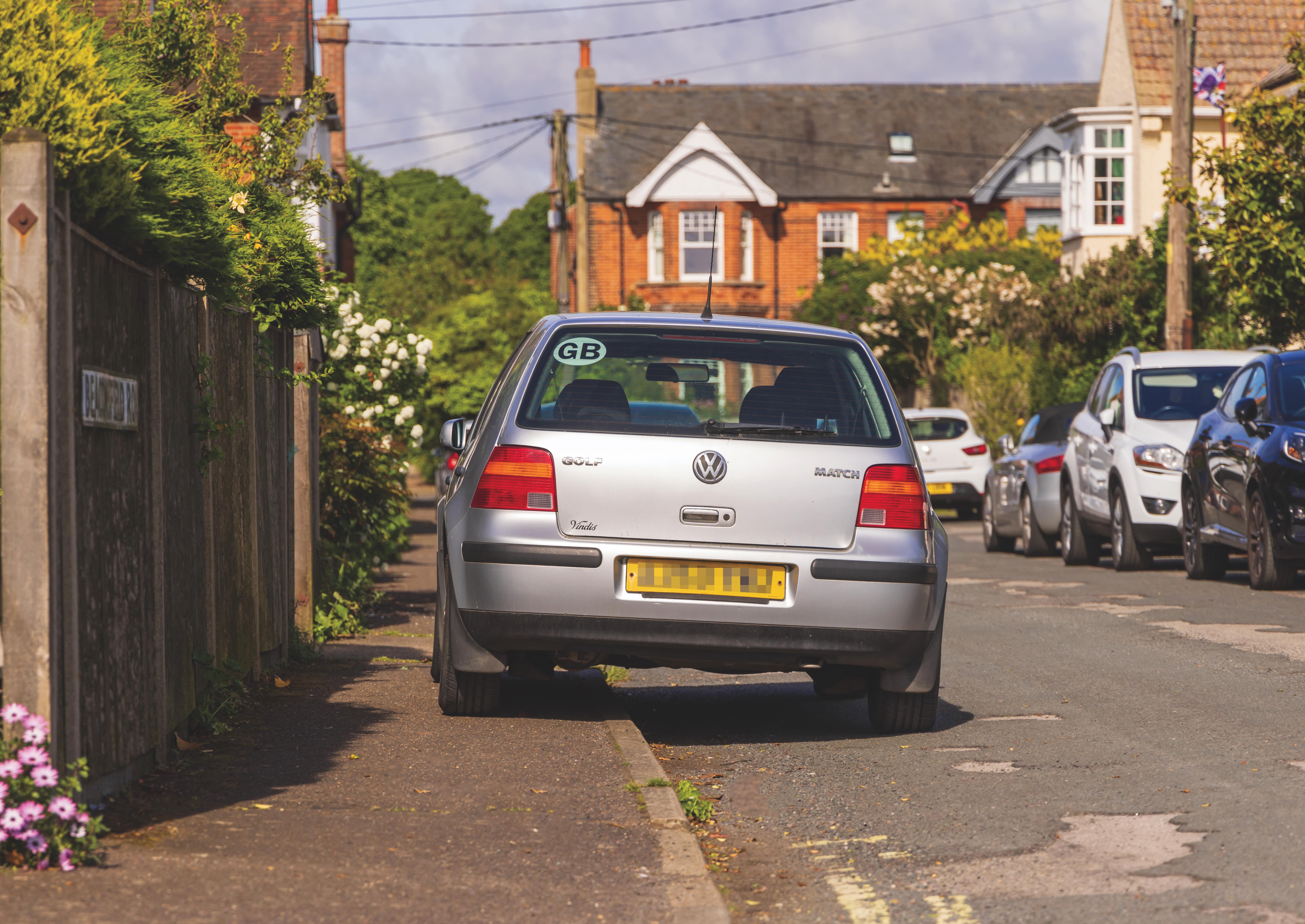 Image of a card parked on the pavement