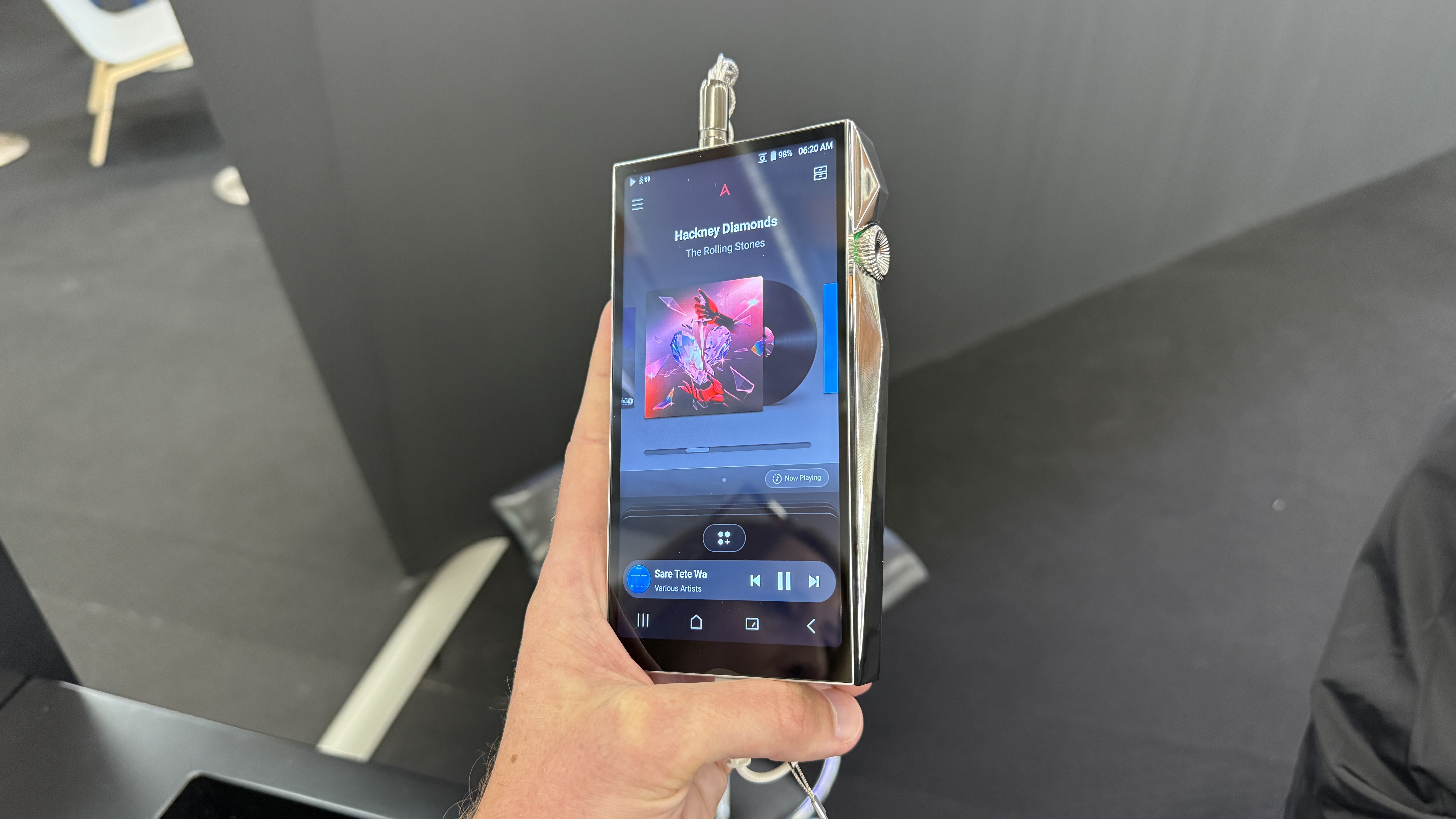 Astell & Kern SP4000 held in a man's hand at the Munich High End Show 2025