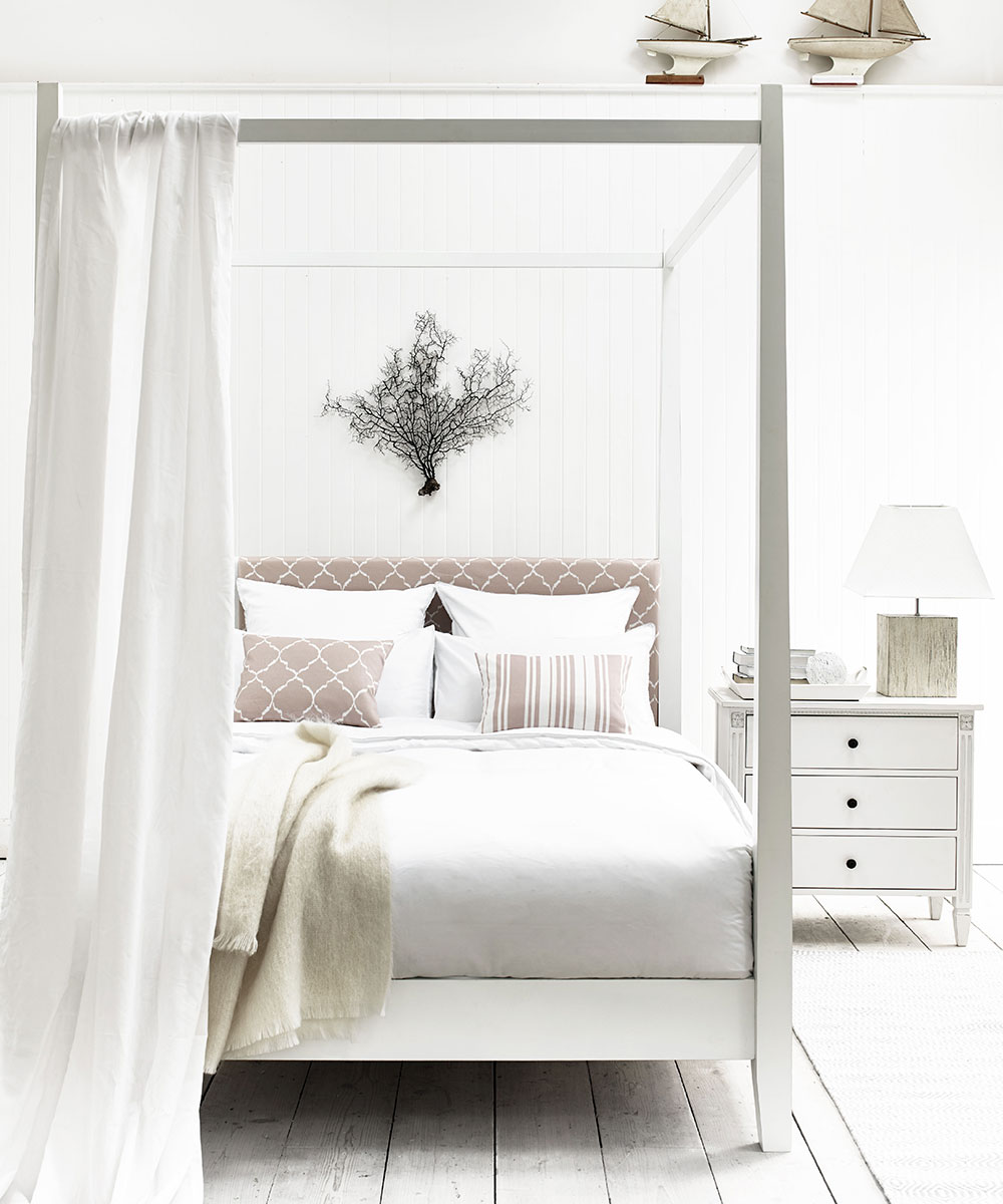 bedroom with white coloured and white curtain